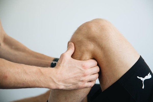 Someone suffering from knee or joint pain Someone suffering from knee or joint pain
